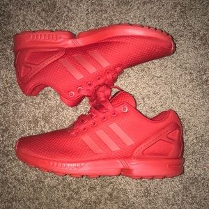 All red adidas Originals ZX Flux sneakers